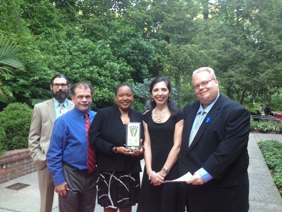 The Communications and Marketing Department at UTHSC was the winner of two awards at the 2014 PRSA Memphis VOX Awards. With the VOX for public service are: (from left) Trey Browder, Memphis Crisis Center board member; Tim Bullard, UTHSC editorial and design specialist; Sheila Champlin, assistant vice chancellor for Communications and Marketing at UTHSC; Peggy Reisser Winburne, media relations and communications specialist at UTHSC; and Mike LaBonte, executive director of the Memphis Crisis Center.