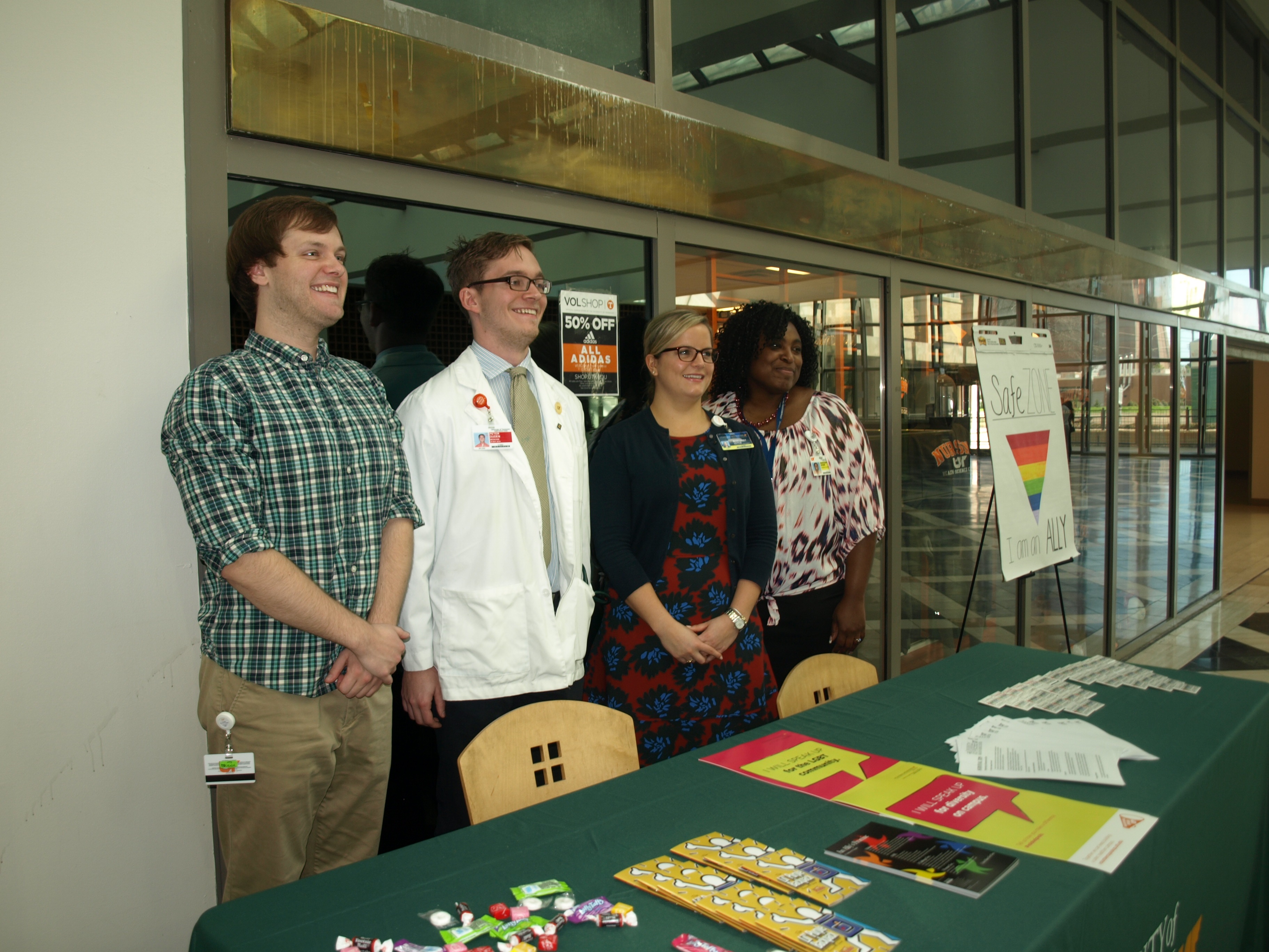 From left, Ben Edwards, M1; Peter Duden, M1; Maggie Joyce, Office of Equity and Diversity; and Nikki Dyer, Student Academic Support Services, offered information at the recent Unite event.