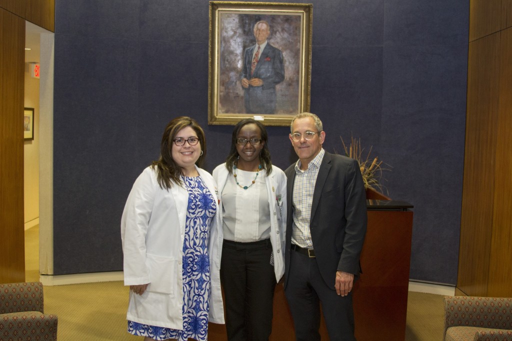 Mercy Kibe, center, is pictured with her mentors, Vanessa Morales-Tirado, MS, PhD, assistant professor of Ophthalmology at UT Health Science Center, and Matthew W. Wilson, MD, FACS, UTHSC professor in the Department of Ophthalmology and director of ocular oncology. Dr. Wilson is also St. Jude Endowed Chair in Pediatric Ophthalmology. 