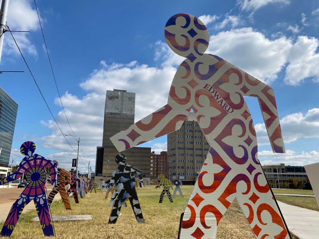 Dozens of pedestrian cutout figures installed in the greenspace on the UTHSC campus stand as silent reminders of those who lost their lives while walking on Memphis streets in 2020.