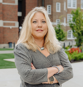 Portrait of Dean Wendy Likes