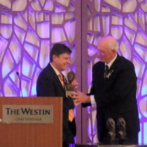 Photo of Dr. James Haynes receiving an award